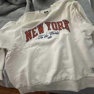 KITH— New York Knicks Vintage Nelson Crewneck
